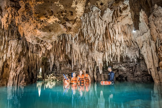 Magical Cenote and Paradise Lagoon Snorkeling Adventure - Entering the cenote’s cave system