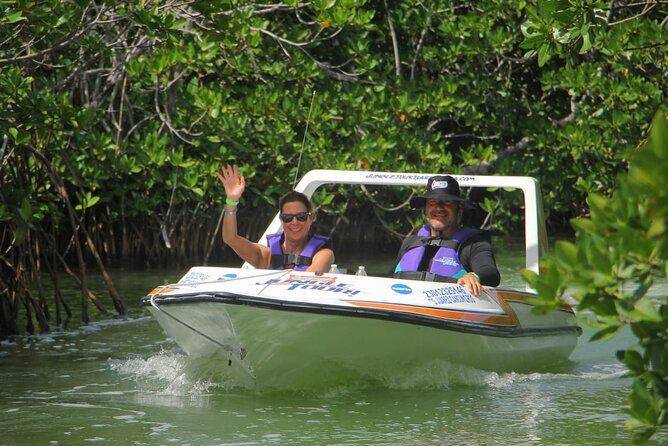 Mangrove and Lagoon Speed Boat Tour - Taking the wheel at Puerto Madero
