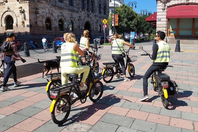 Mexico City E-Bike Tour with a taco and churros stop - Reforma and the Revolution Monument put the city in context