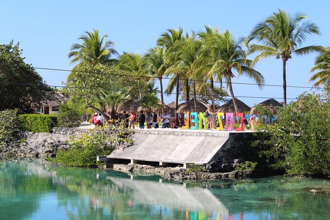 Official Chankanaab Beach Park Day pass with Snorkel - Relaxing on the beach after the water