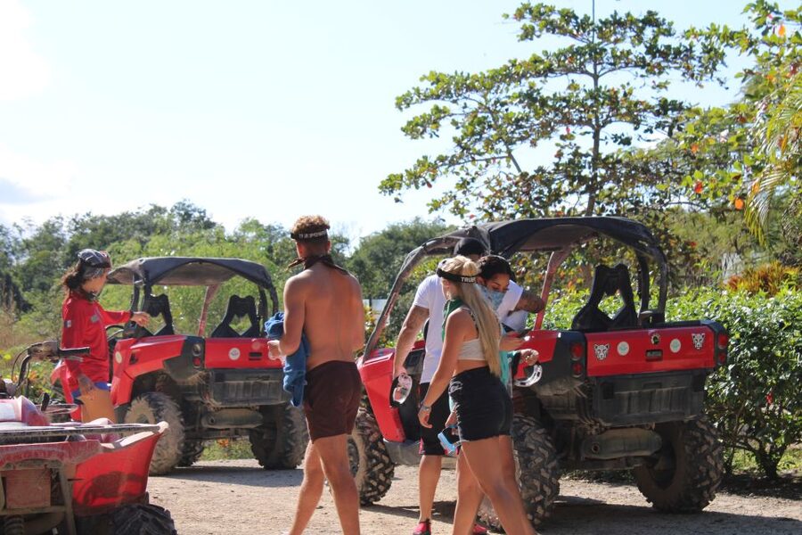 Playa del Carmen: Riviera Maya Buggy Tour with Cenote Swim - Entering the clear underground cenote