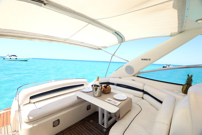 Private Premium Yacht 46FT Rental in Cancún - Snorkeling, paddleboarding, and swimming stops