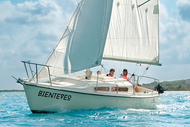 Private Sailboat + Captain for a Day Experience - Lake Bacalar and the changing blue water