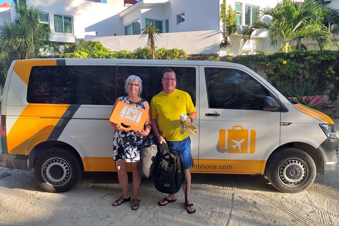 Private Transfer from Cancun Airport to Playa del Carmen - Finding the orange suitcase outside the terminal