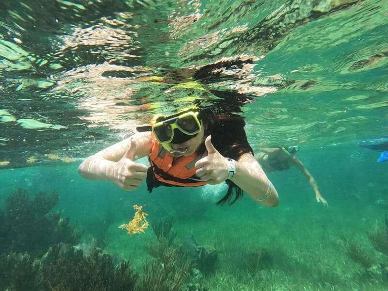 Puerto Morelos: Guided Snorkeling Tour with Gear & Fees - First reef site: clear water and shallow coral