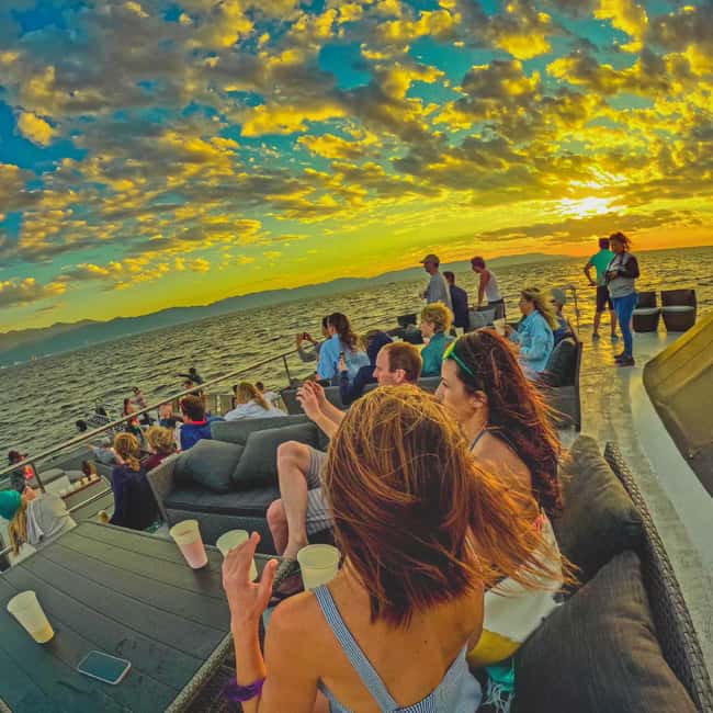 Puerto Vallarta: Mega Yacht Whale Watching Sunset Cruise - Sunset, music, and Vallarta after dark