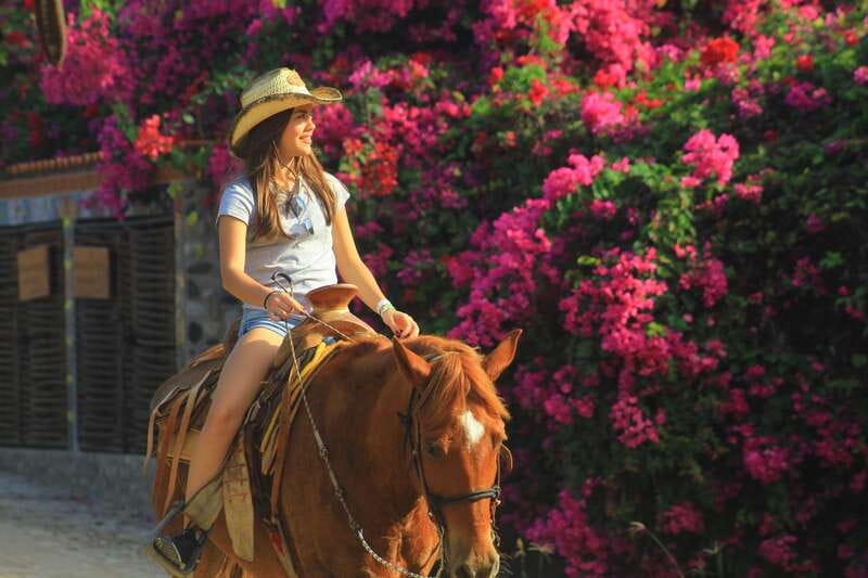 Punta de Mita/Sayulita: Horseback Riding Tour - Riding through a typical Mexican town