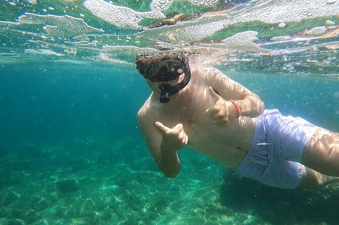 Snorkel Privately in Cabo San Lucas - Cruising past Cabo’s Arch and rocky coast