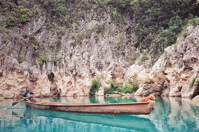 Tamul waterfall and water cave on a wooden canoe - Swimming at Cueva del Agua