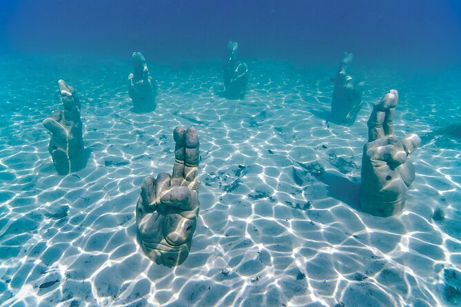 Top Isla Mujeres Catamaran Tour with Snorkel Open Bar and Buffet lunch - What the $37 price really buys you