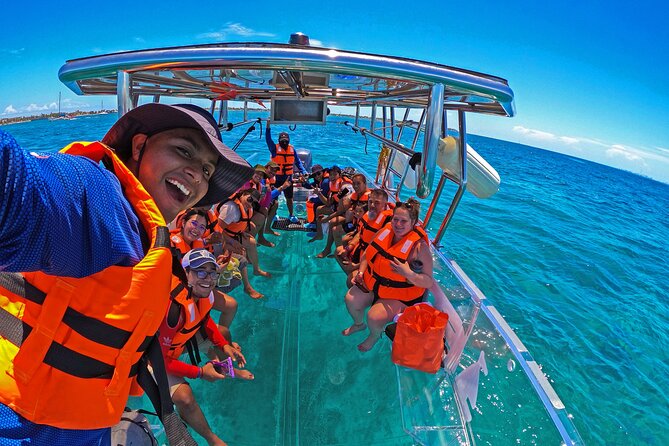 Tour Isla Mujeres excursion in Collective Transparent Boat - What this transparent boat ride is really like