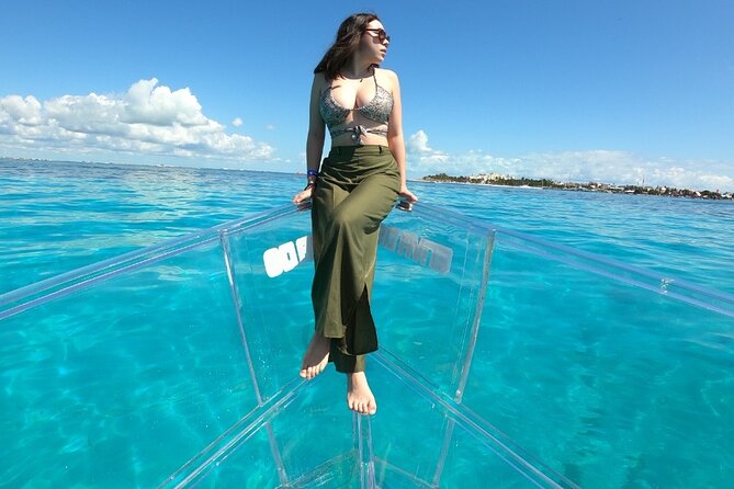 Tour Isla Mujeres excursion in Collective Transparent Boat - The marine life depends on weather and timing