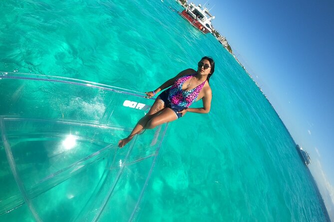 Tour Isla Mujeres excursion in Collective Transparent Boat - Who will enjoy this most