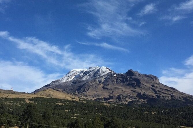 Trekking Through The Volcanoes - Cerro Altzomoni and the view toward Popocatépetl