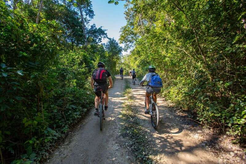 Tulum: Cenote Trail Bike Tour - Zip lines and canoeing above the water