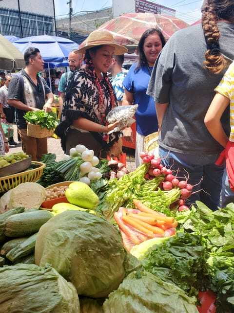 Xochimilco: Market, Food and Nature ¡All included! Tour - Cooking tlapique aboard a traditional trajinera